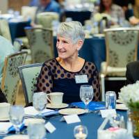 Student with two donors at Scholarship Dinner 2019